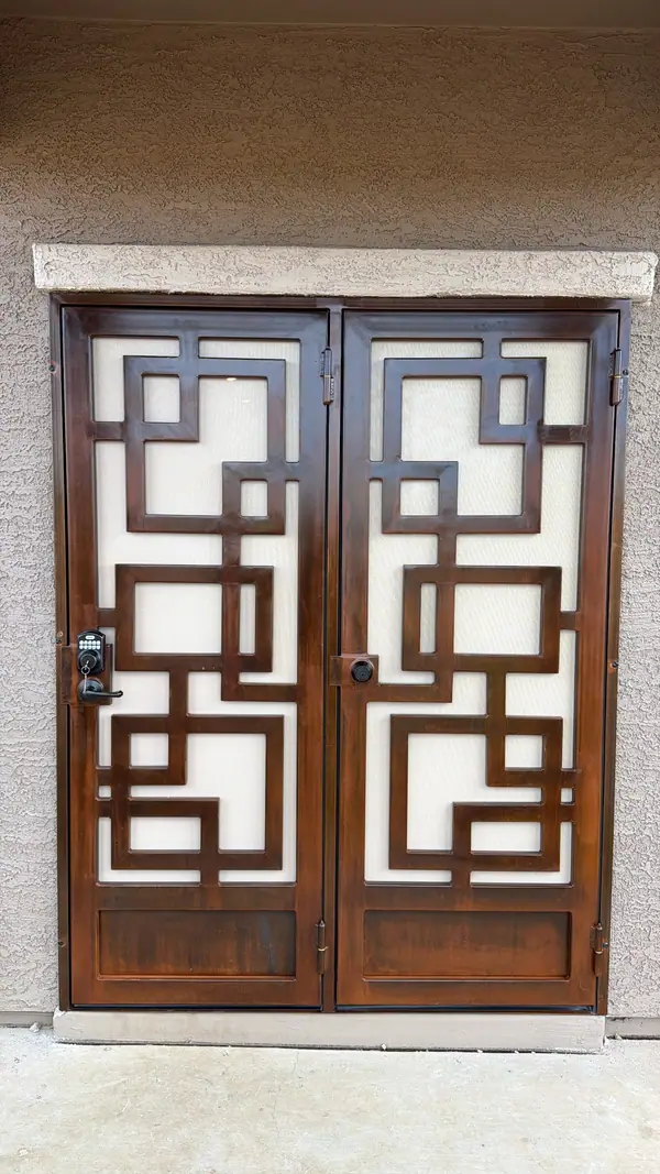 Real job: bronze double security doors with interlocking squares